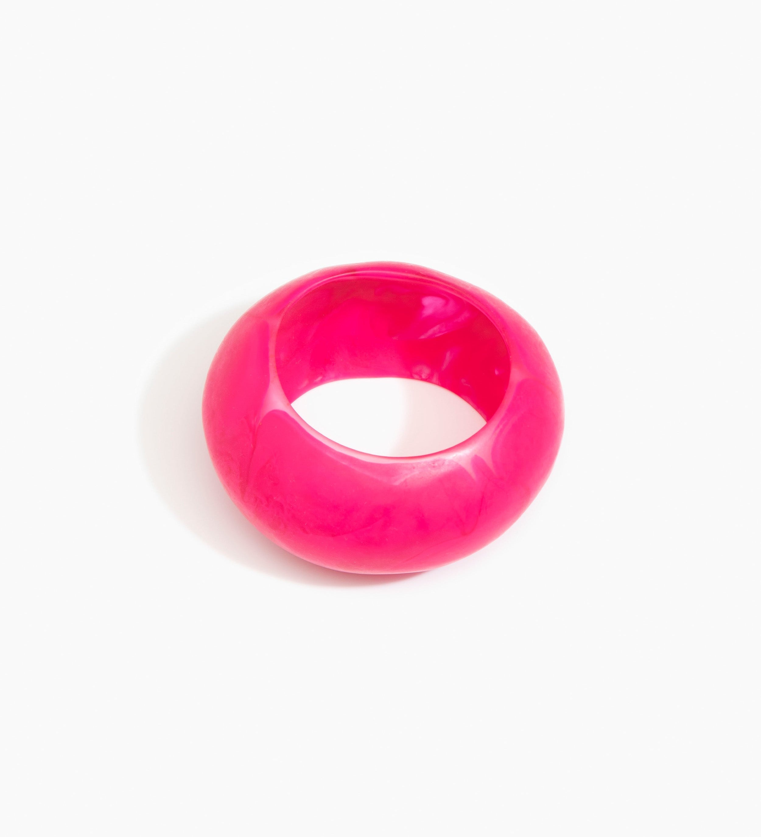 Dinosaur Designs Boulder Bangle Bracelets in Flamingo color resin with Wide Fit