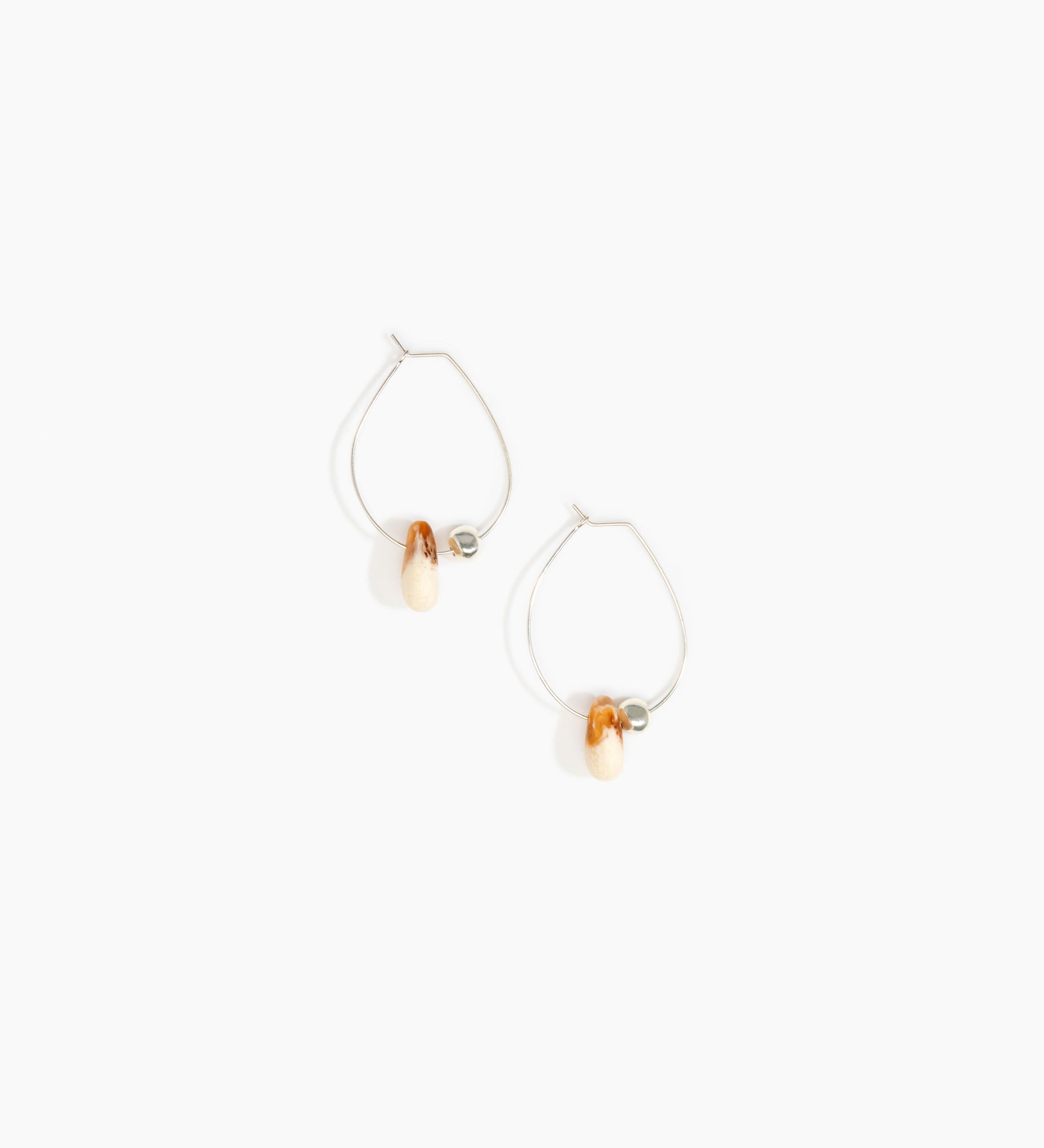 Dinosaur Designs Joie De Vivre Hoop Earrings Earrings in Light Horn color resin with 925 Sterling Silver Material