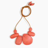 Dinosaur Designs Riverstone Choker Necklaces in Coral Swirl color resin with Brass Bead on Tan Leather Material