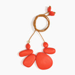 Dinosaur Designs Riverstone Choker Necklaces in Coral Pop color resin with Brass Bead on Tan Leather Material