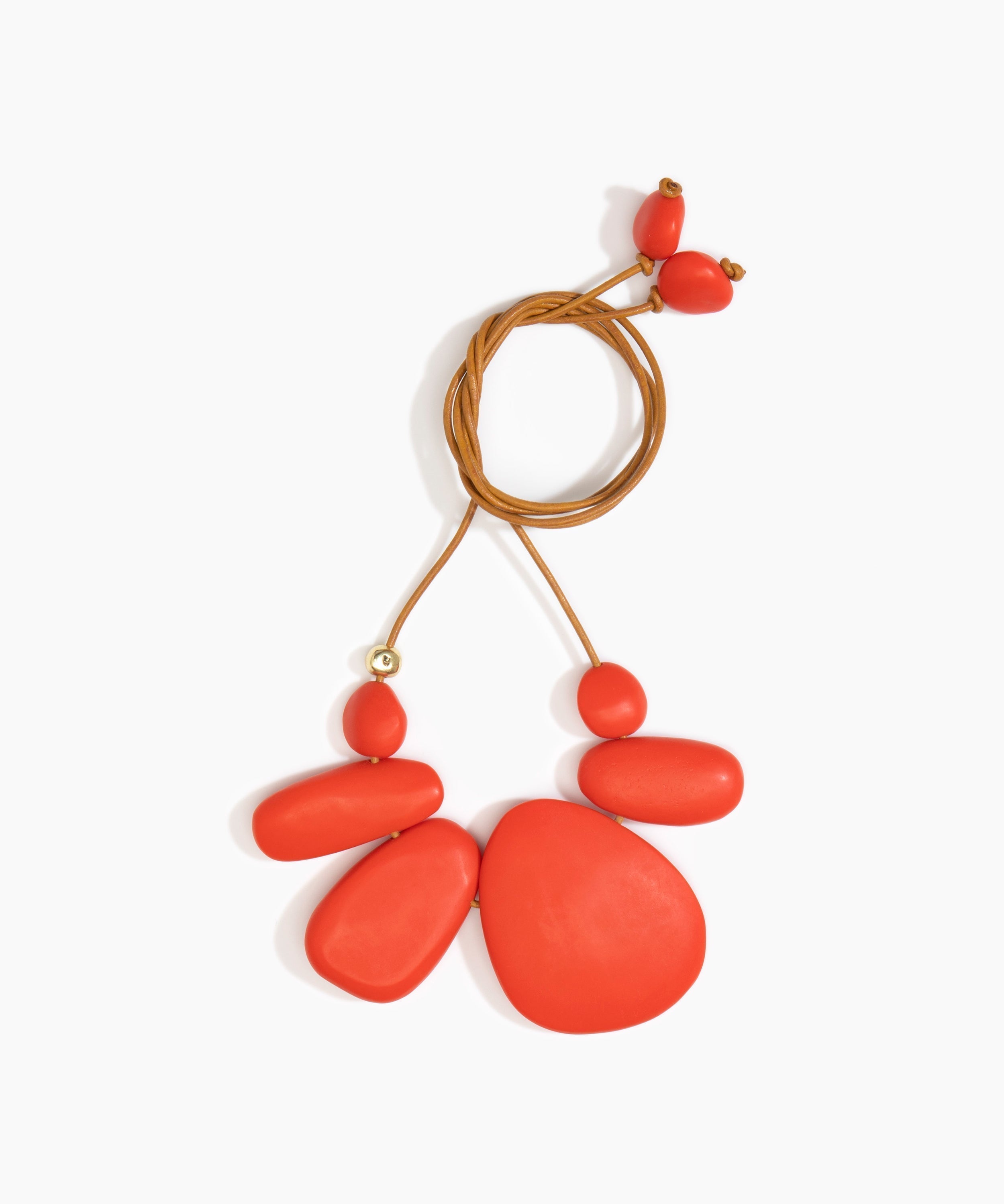 Dinosaur Designs Riverstone Choker Necklaces in Coral Pop color resin with Brass Bead on Tan Leather Material