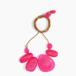 Dinosaur Designs Riverstone Choker Necklaces in Flamingo color resin with Brass Bead on Tan Leather Material