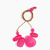 Dinosaur Designs Riverstone Choker Necklaces in Flamingo color resin with Brass Bead on Tan Leather Material