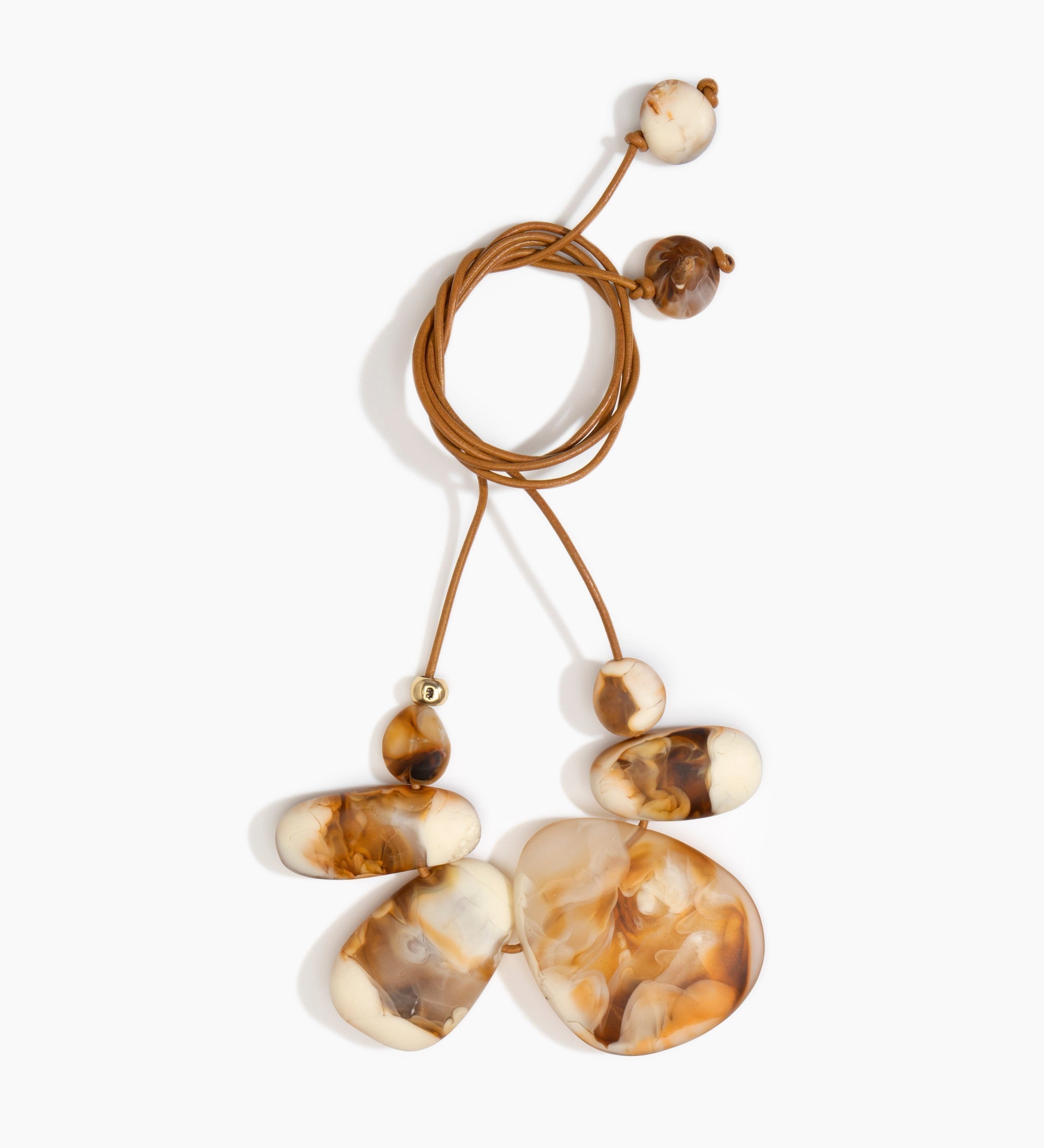 Dinosaur Designs Riverstone Choker Necklaces in Light Horn color resin with Brass Bead on Tan Leather Material