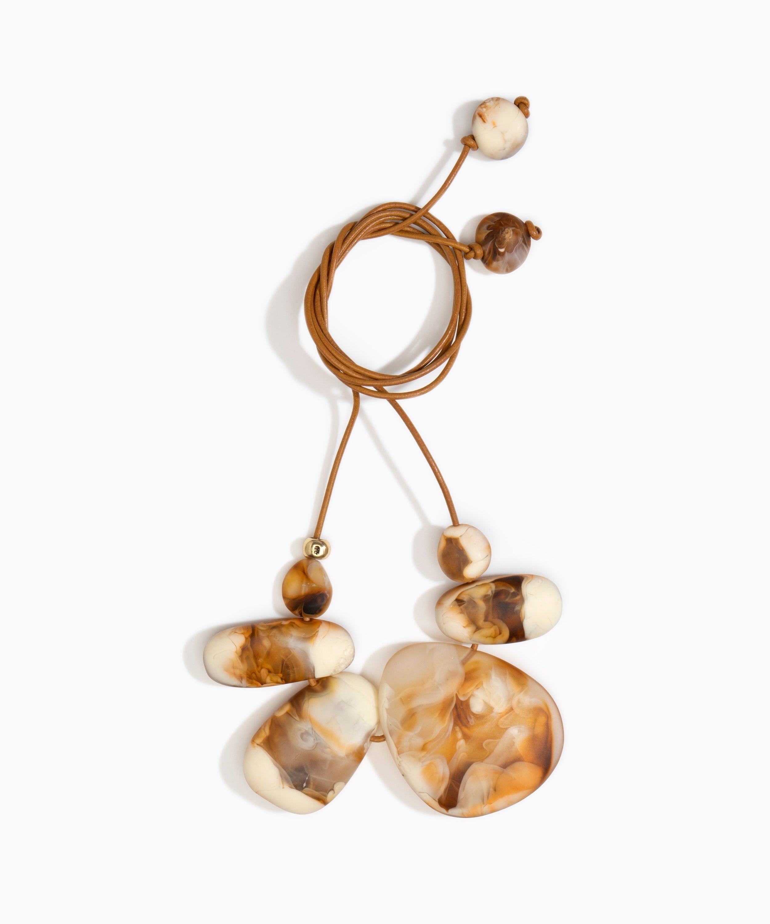 Dinosaur Designs Riverstone Choker Necklaces in Light Horn color resin with Brass Bead on Tan Leather Material