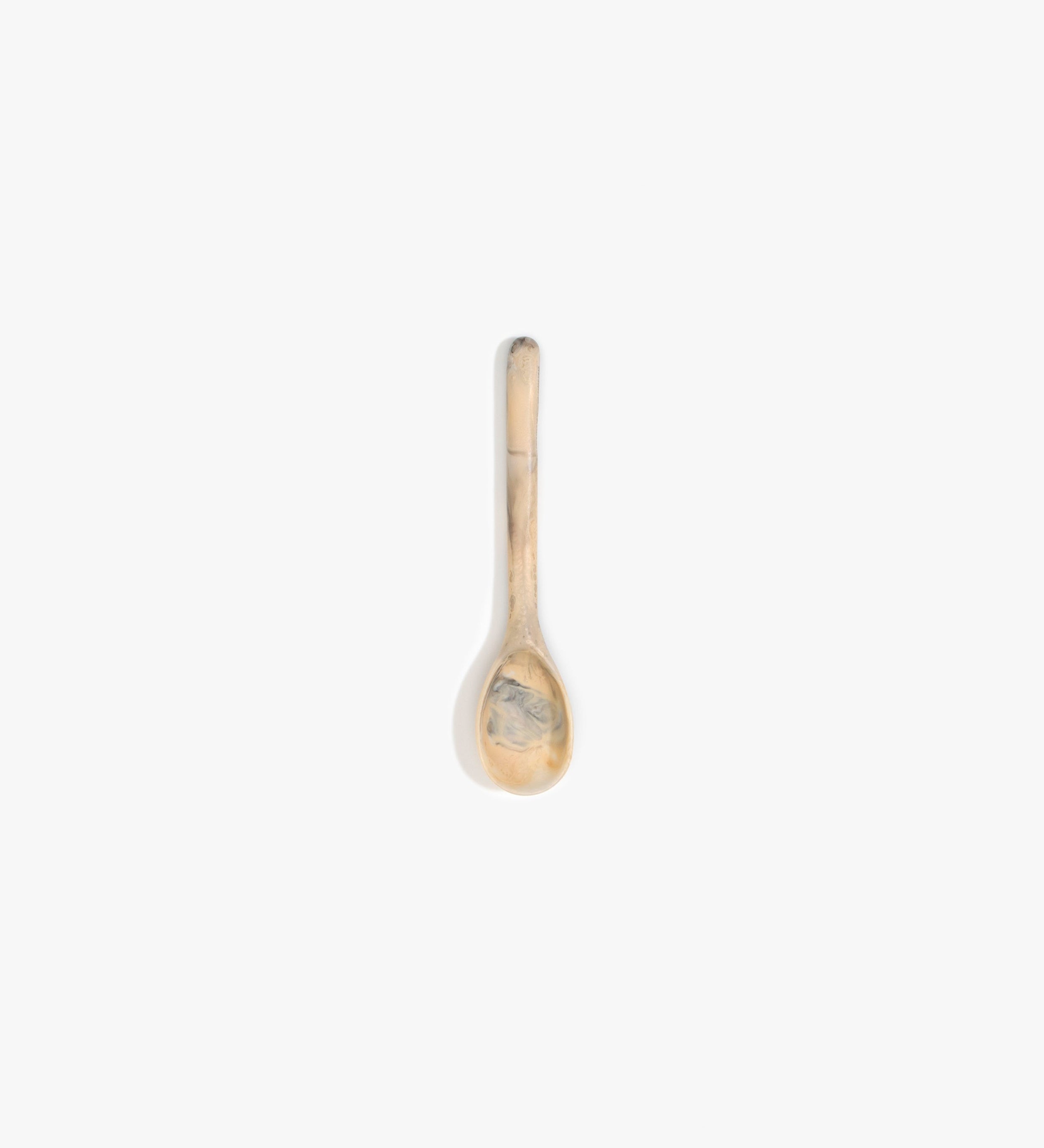 Dinosaur Designs Stone Spoon Tableware in Sandy Pearl color resin