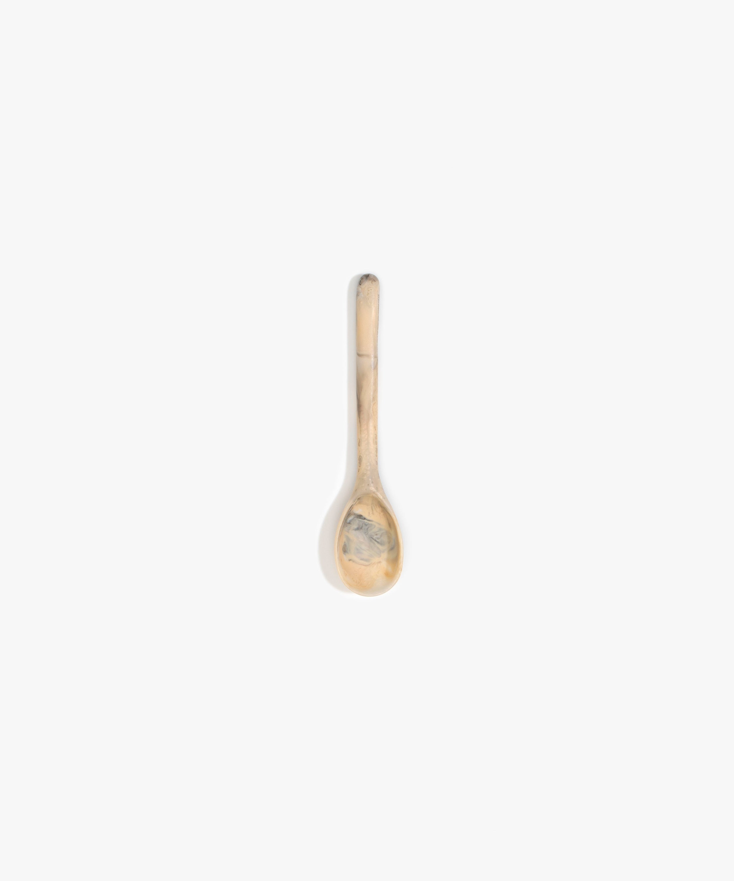 Dinosaur Designs Stone Spoon Tableware in Sandy Pearl color resin