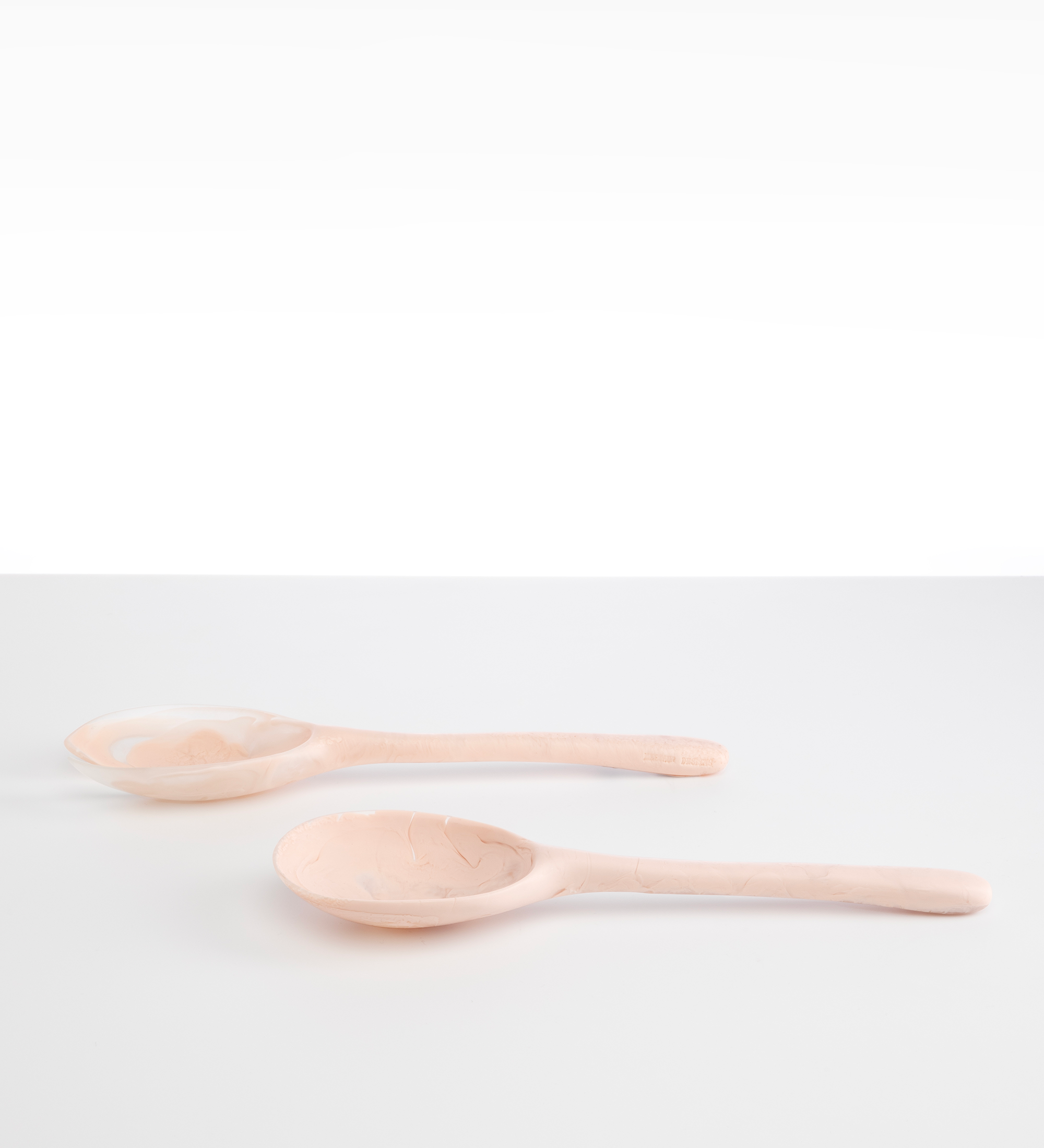 Dinosaur Designs Long Stone Servers Tableware in Rose Swirl color resin