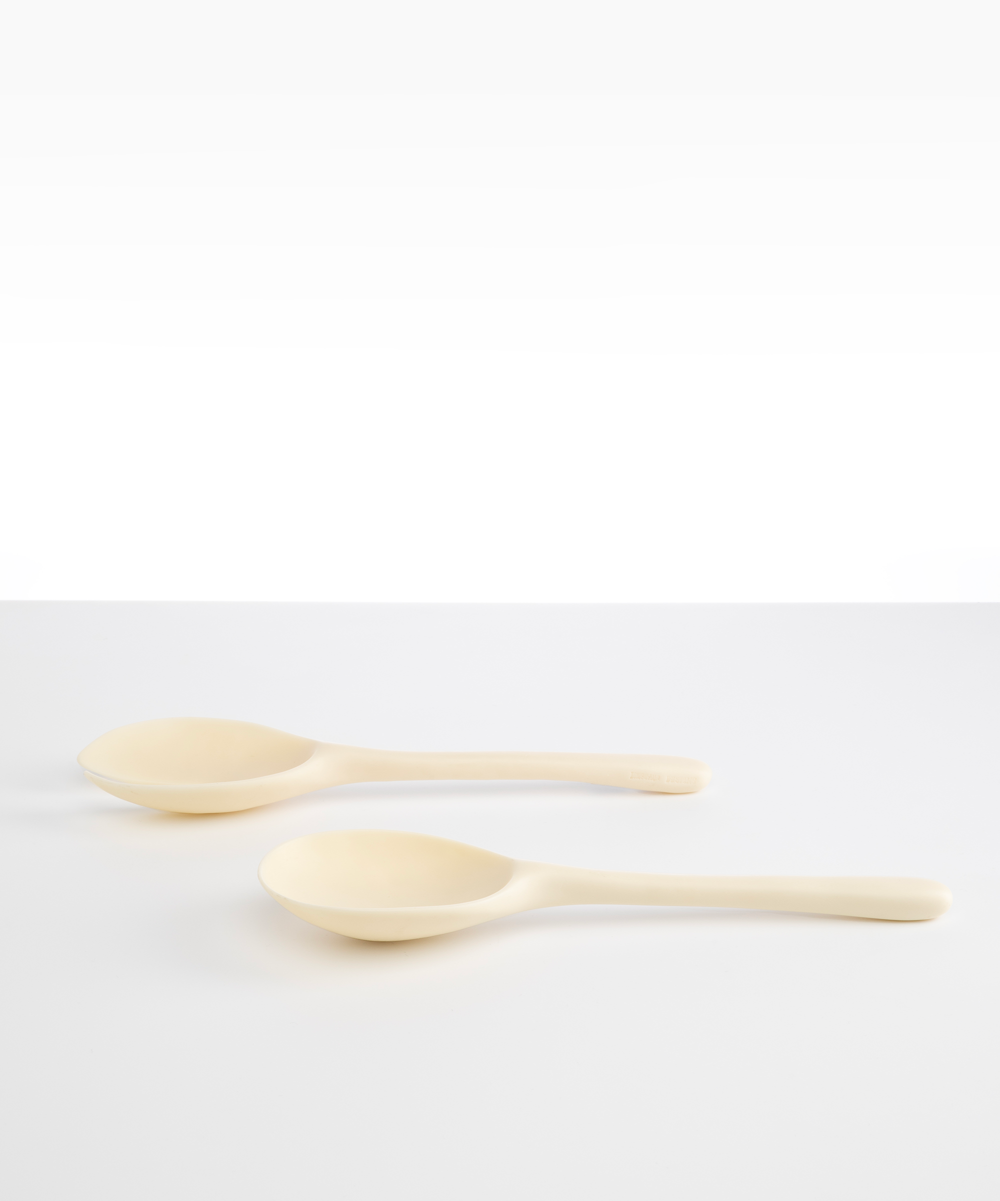 Dinosaur Designs Long Stone Servers Tableware in Cream color resin