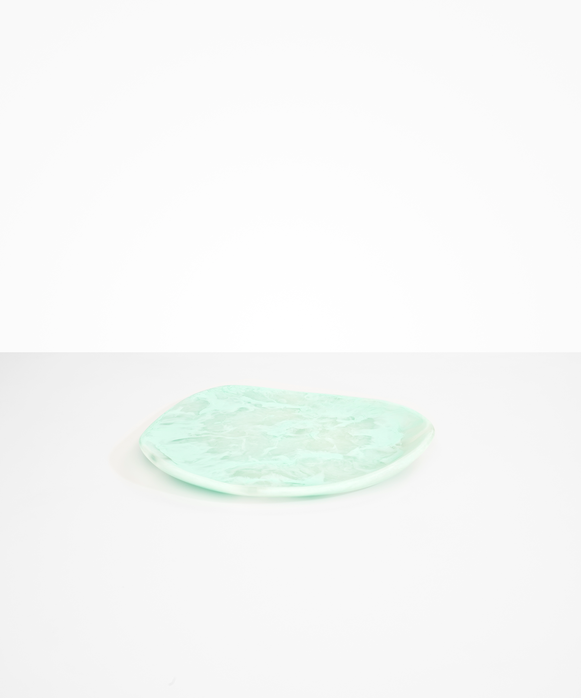 Dinosaur Designs Pebble Plate Serving Platters in Mint color resin