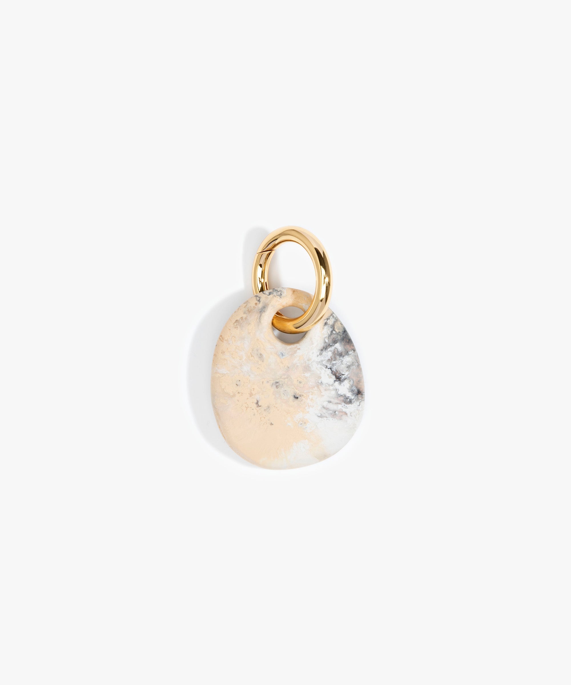 Dinosaur Designs Earth Keyring Keychains in Sandy Pearl color resin with Brass Metal