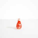 Dinosaur Designs Medium Liquid Vase Vases in Strawberry color resin