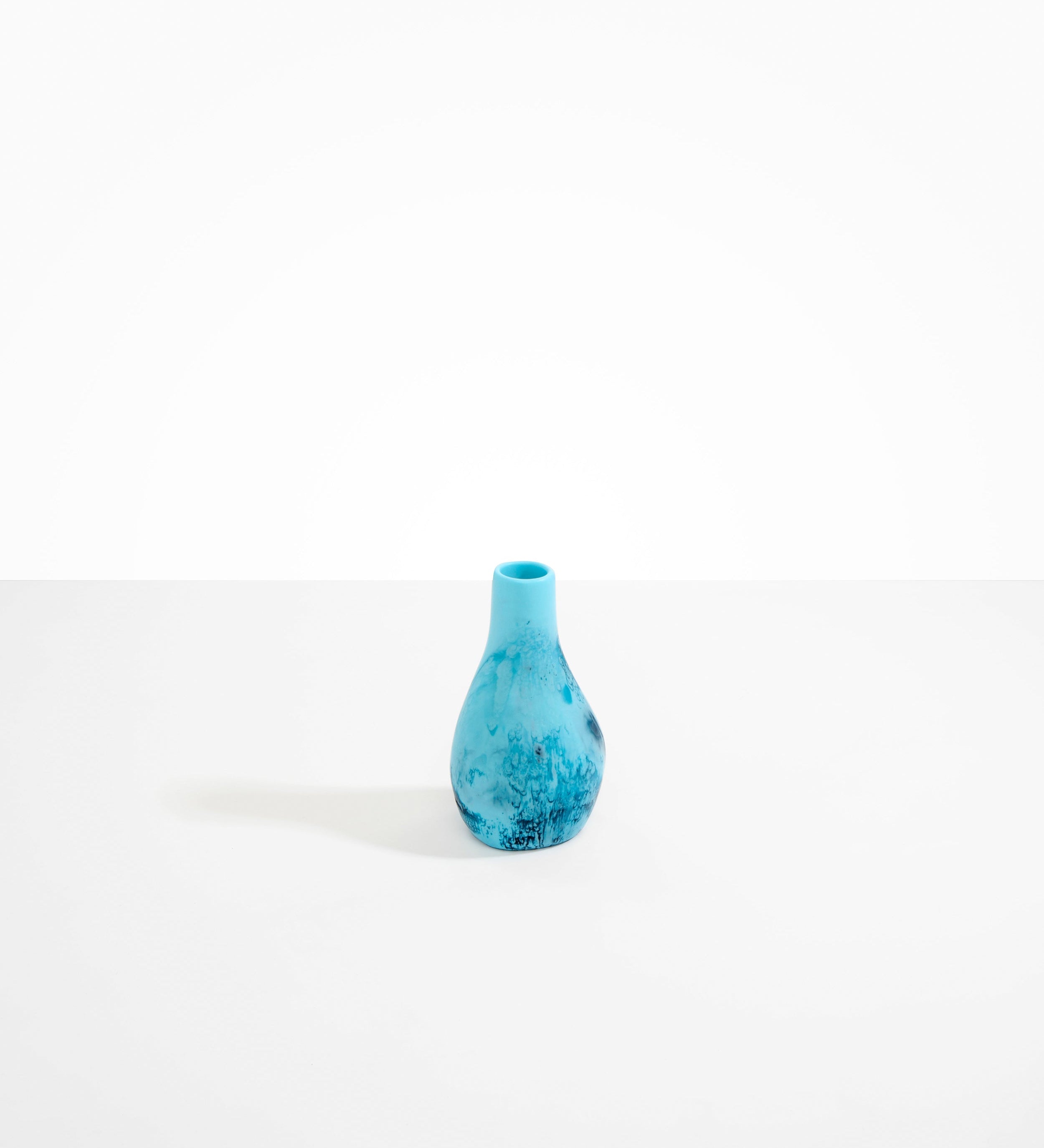 Dinosaur Designs medium sized Liquid vase in water blue color resin