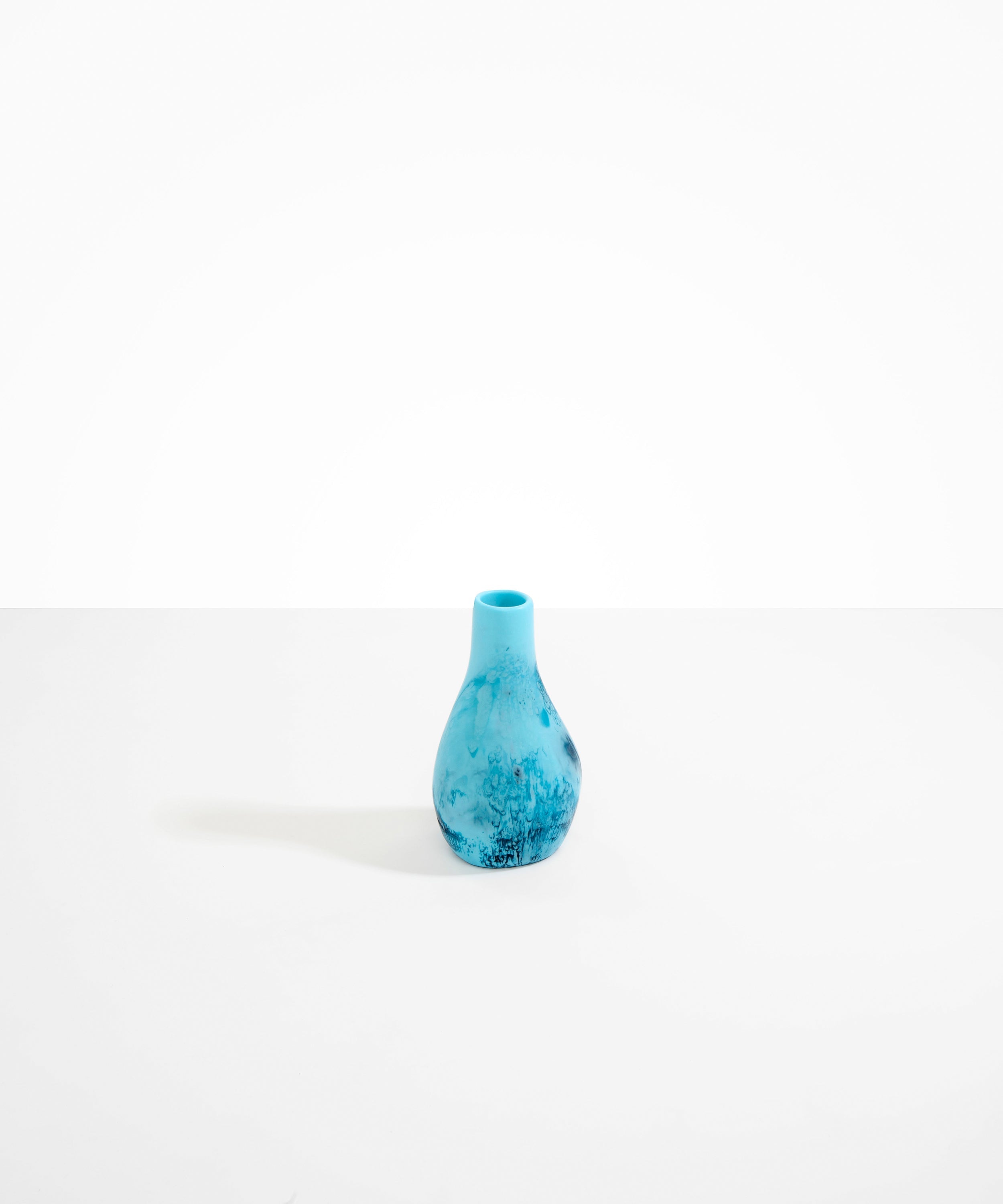 Dinosaur Designs medium sized Liquid vase in water blue color resin