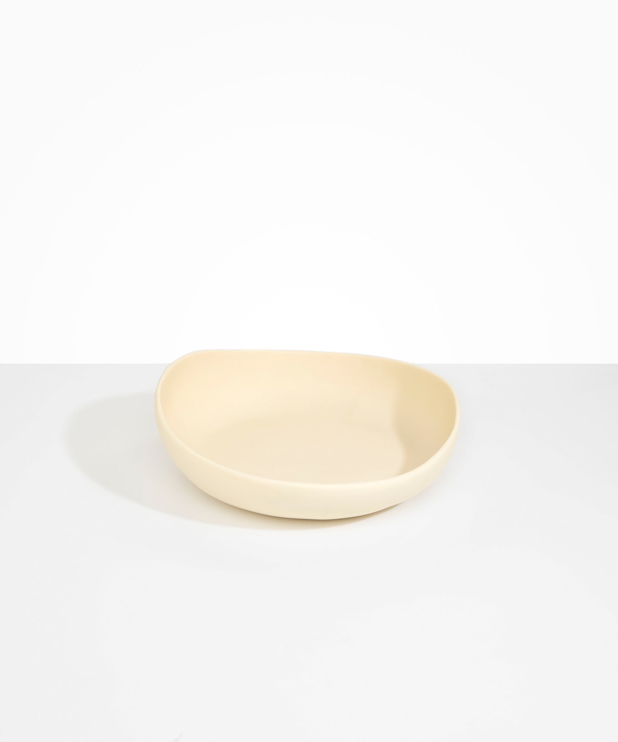 Dinosaur Designs Medium Flow Bowl Bowls in Cream color resin