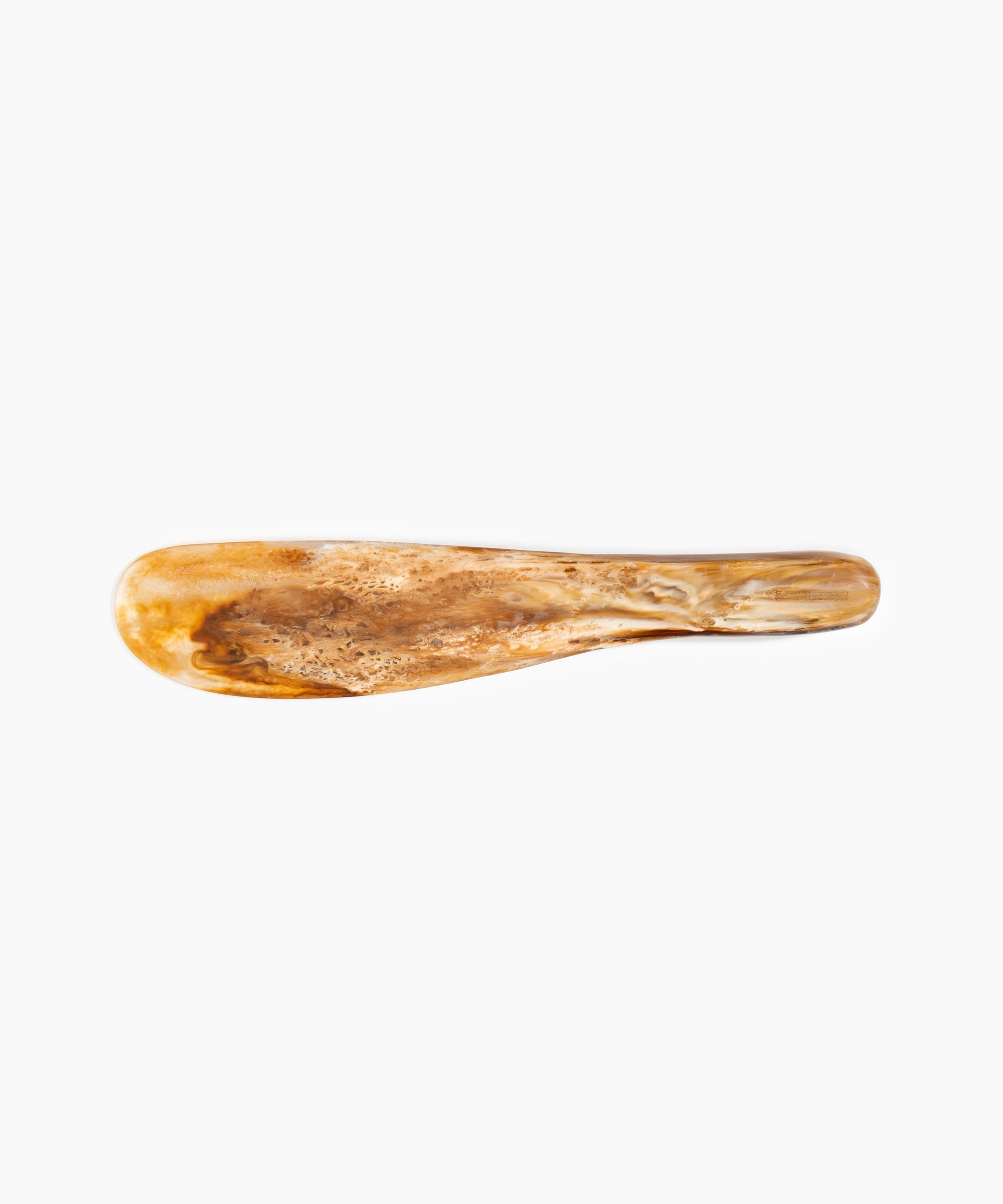 Dinosaur Designs Temple Cake Knife cake knife and server in light horn brown colored resin.