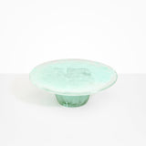 Dinosaur Designs Temple cake stand and plate in mint green color resin