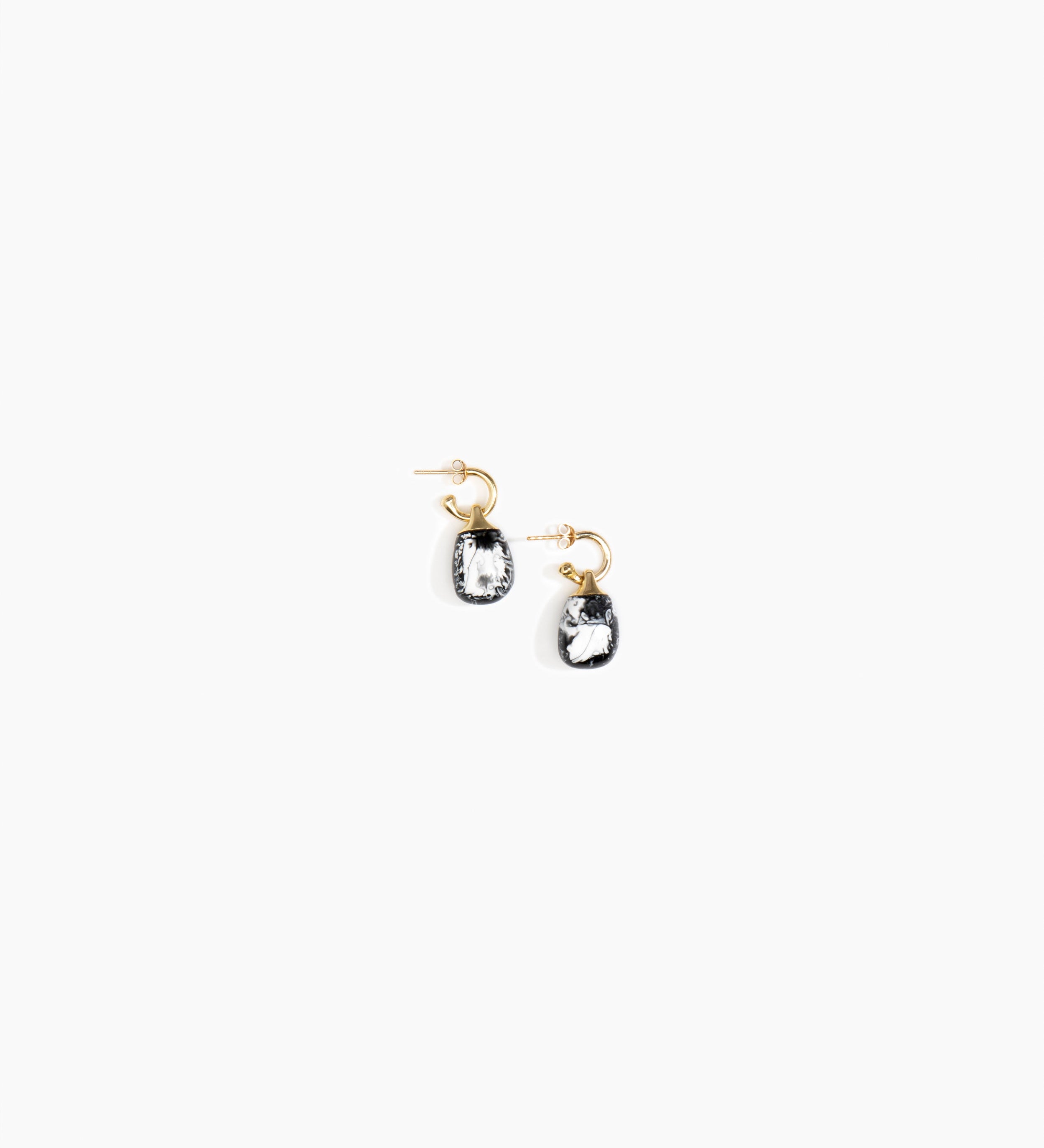 Dinosaur Designs Small River Rock Hoops Earrings in Black Marble color resin with Brass Hoop Material