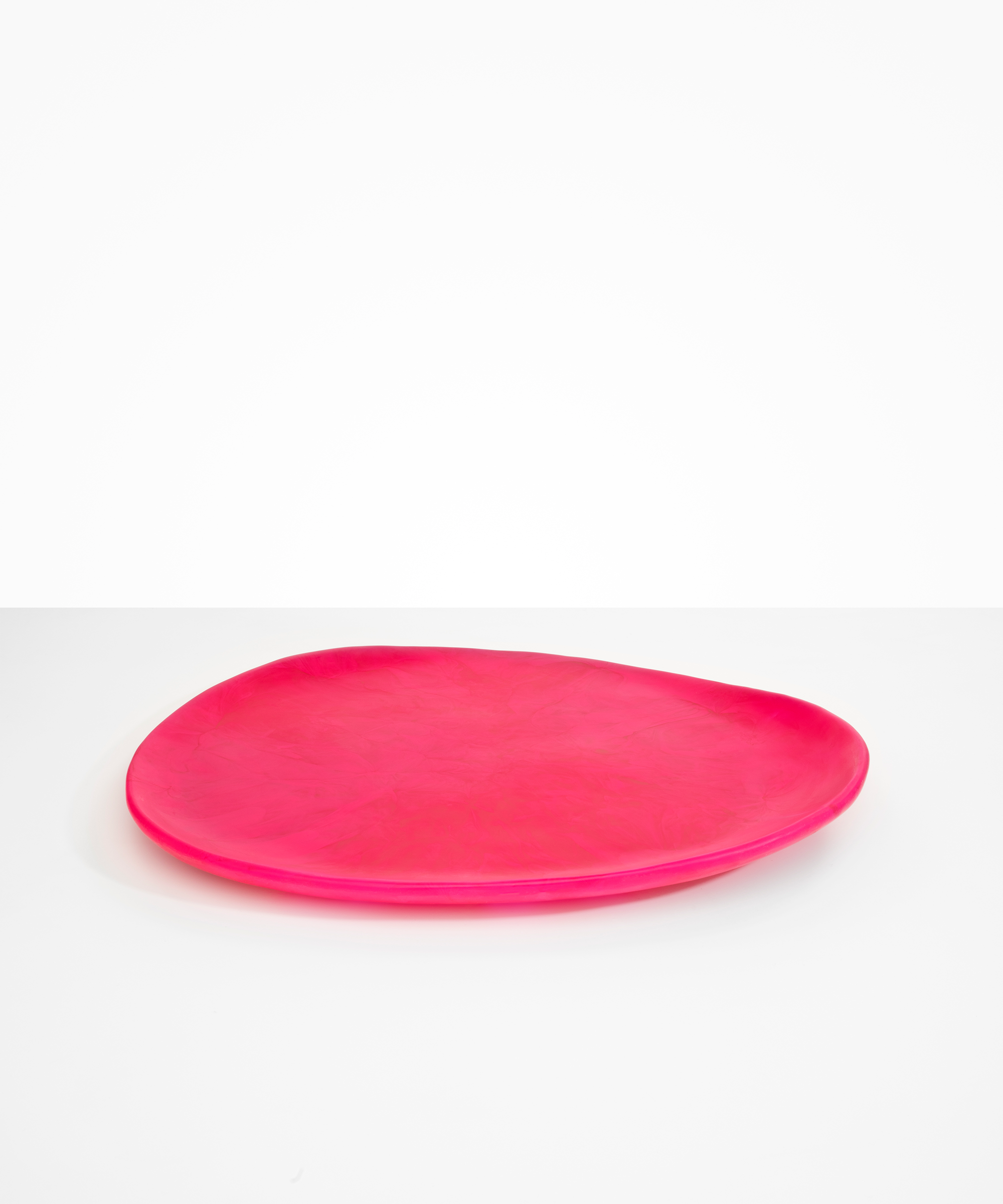 Dinosaur Designs Large Pebble Platter Serving Platters in Flamingo color resin