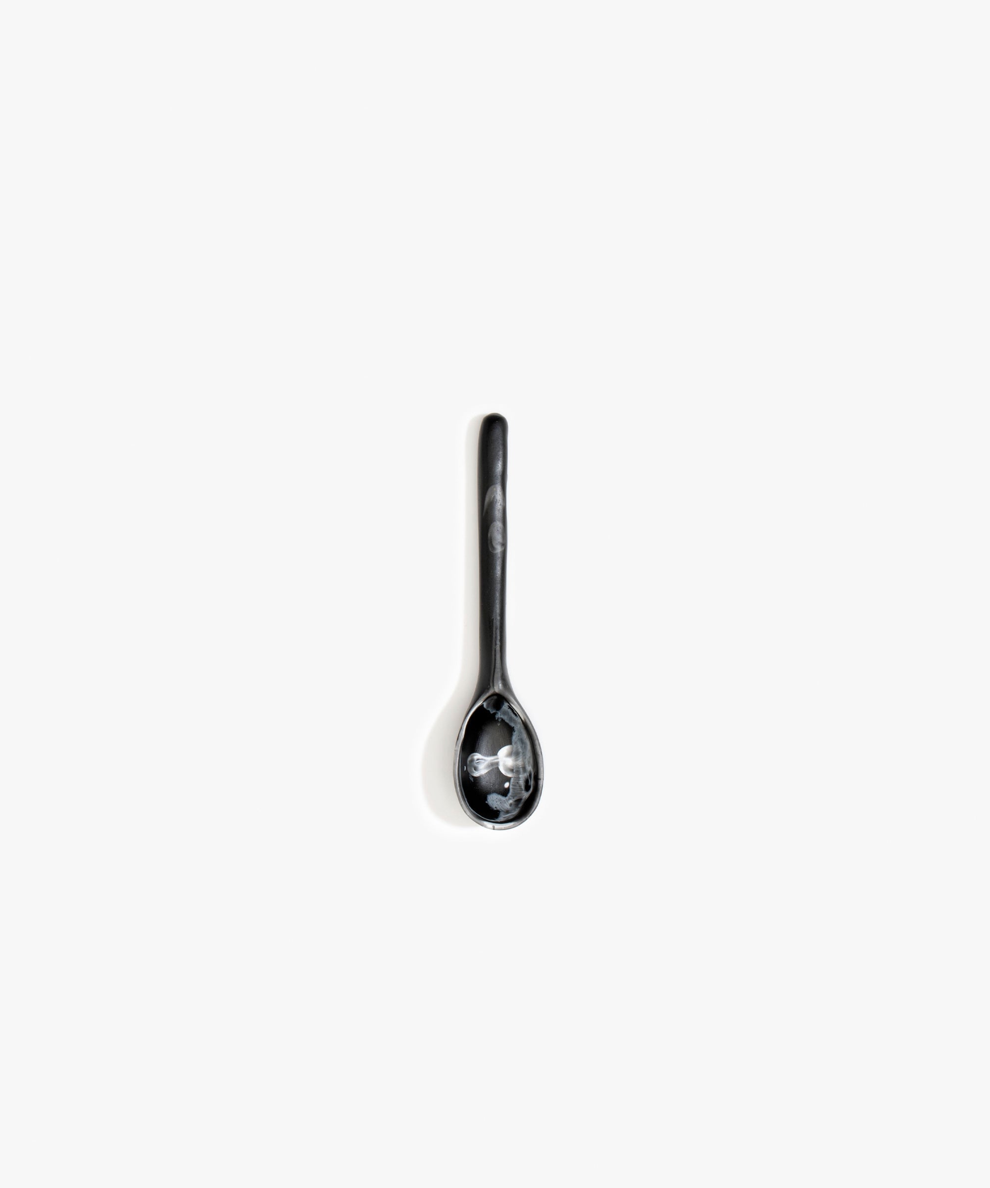 Dinosaur Designs Stone Spoon Tableware in Black Marble color resin