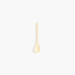 Dinosaur Designs Shell Spoon Tableware in Cream color resin 