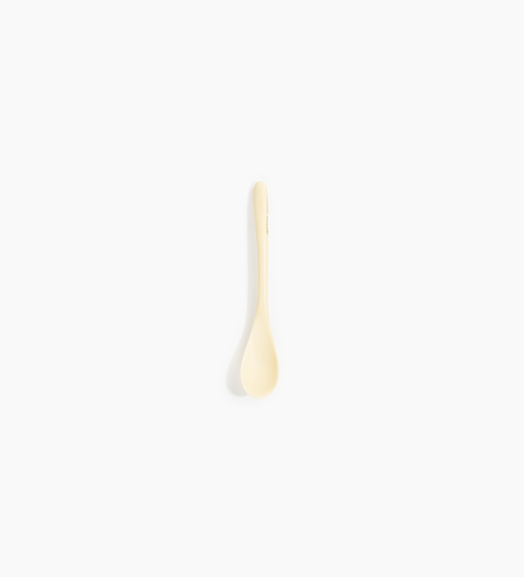 Dinosaur Designs Shell Spoon Tableware in Cream color resin 