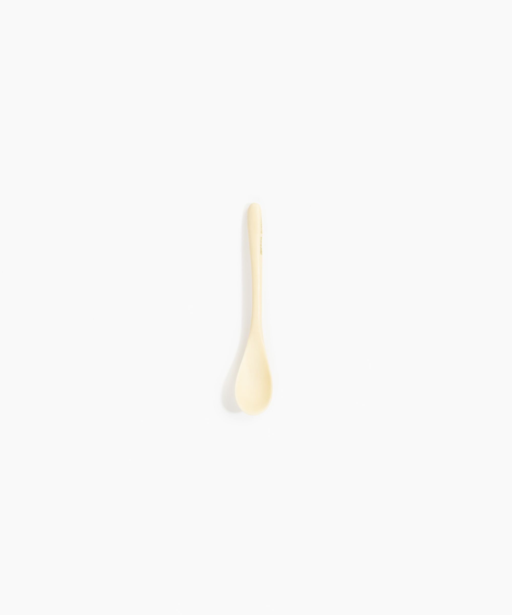 Dinosaur Designs Shell Spoon Tableware in Cream color resin 