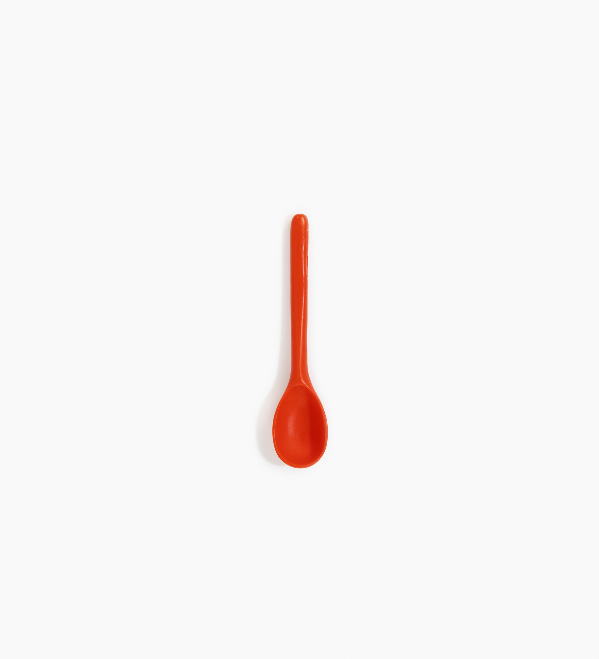 Dinosaur Designs Stone Spoon Tableware in Coral Pop color resin