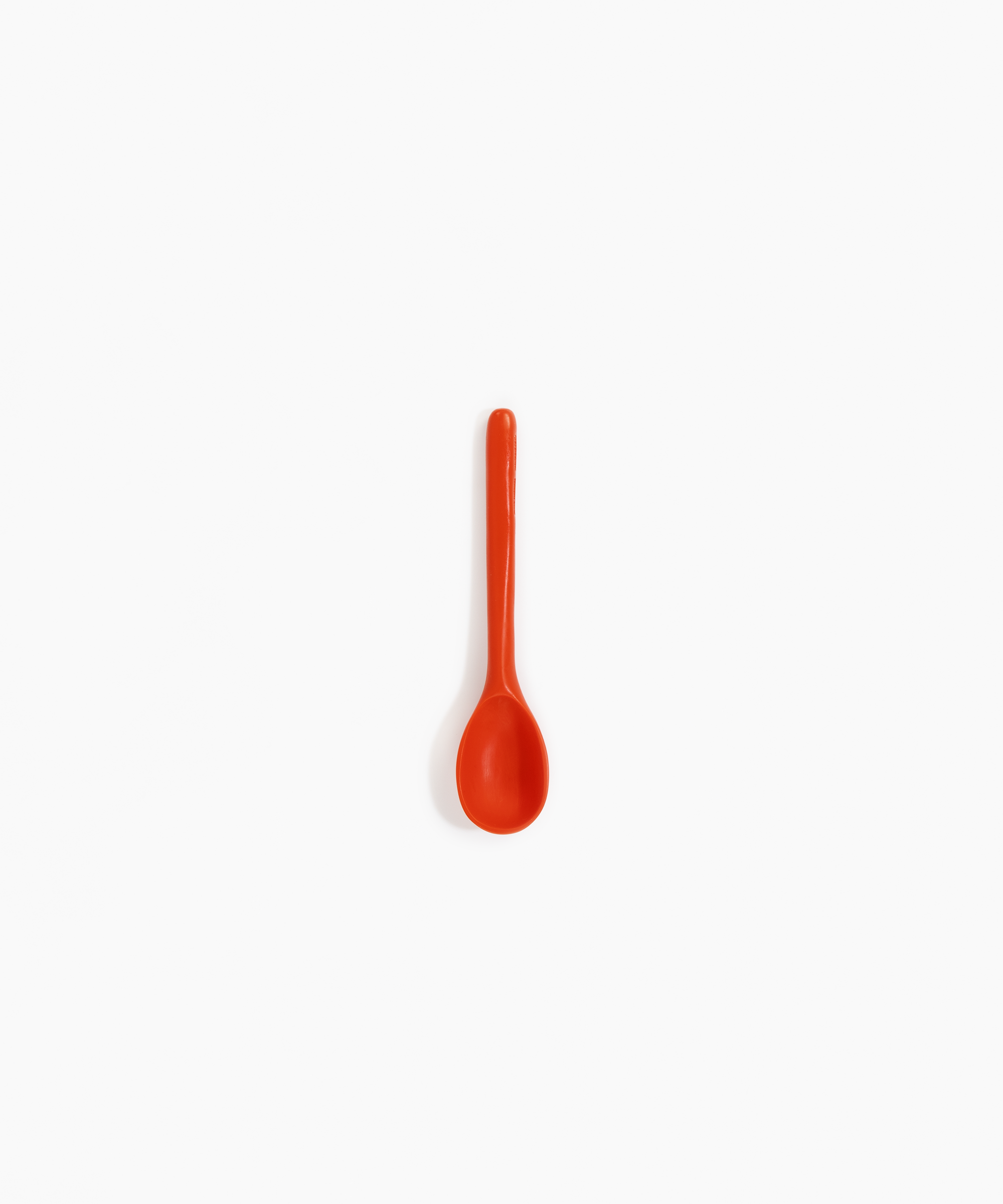 Dinosaur Designs Stone Spoon Tableware in Coral Pop color resin