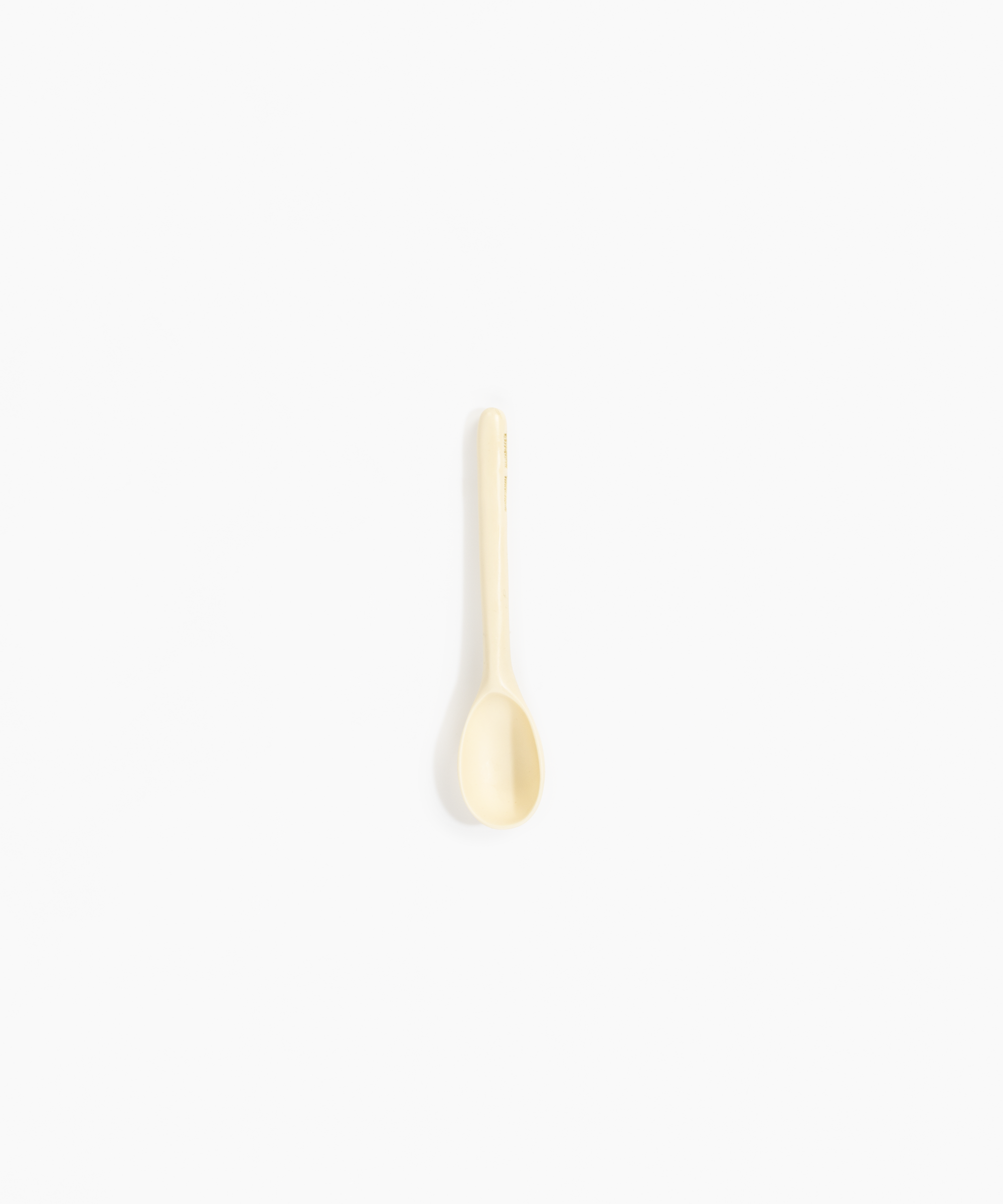 Dinosaur Designs Stone Spoon Tableware in Cream color resin